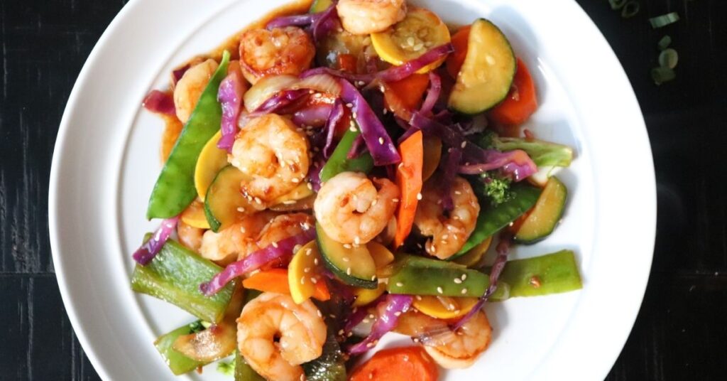 A truly authentic Asian Teriyaki Stir-Fry with Shrimp, made with fresh vegetables and a stove top homemade glaze that tastes like you ordered takeout.