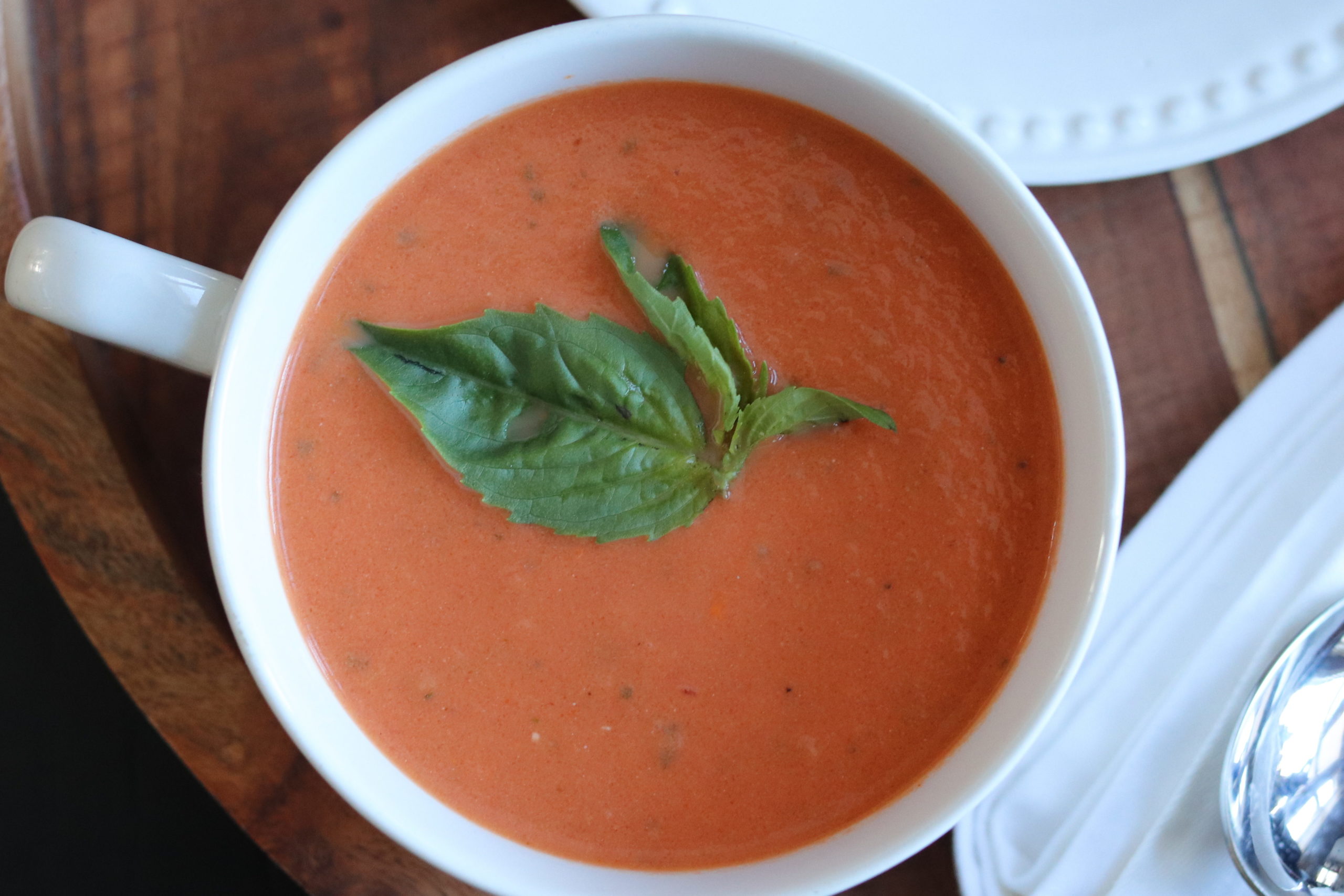 From the first dip of the spoon in the bowl, you are in love. This homemade tomato soup is creamy and tangy with tomatoes and V8 juice. Then, you get just a hint of heat that balances with the goat cheese and the freshness of the basil.  Yummy!!