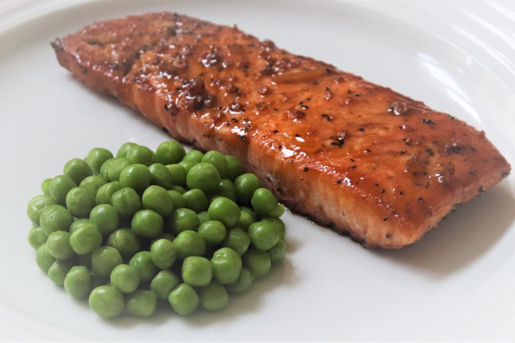 Salmon glazed in honey and a bright citrus orange sauce… what a fantastic combo for salmon! Just a few wholesome ingredients, and WOW!  This honey orange glazed salmon recipe is easy and flavorful. Salmon fillets are pan-seared and covered in fantastic honey orange garlic sauce. 